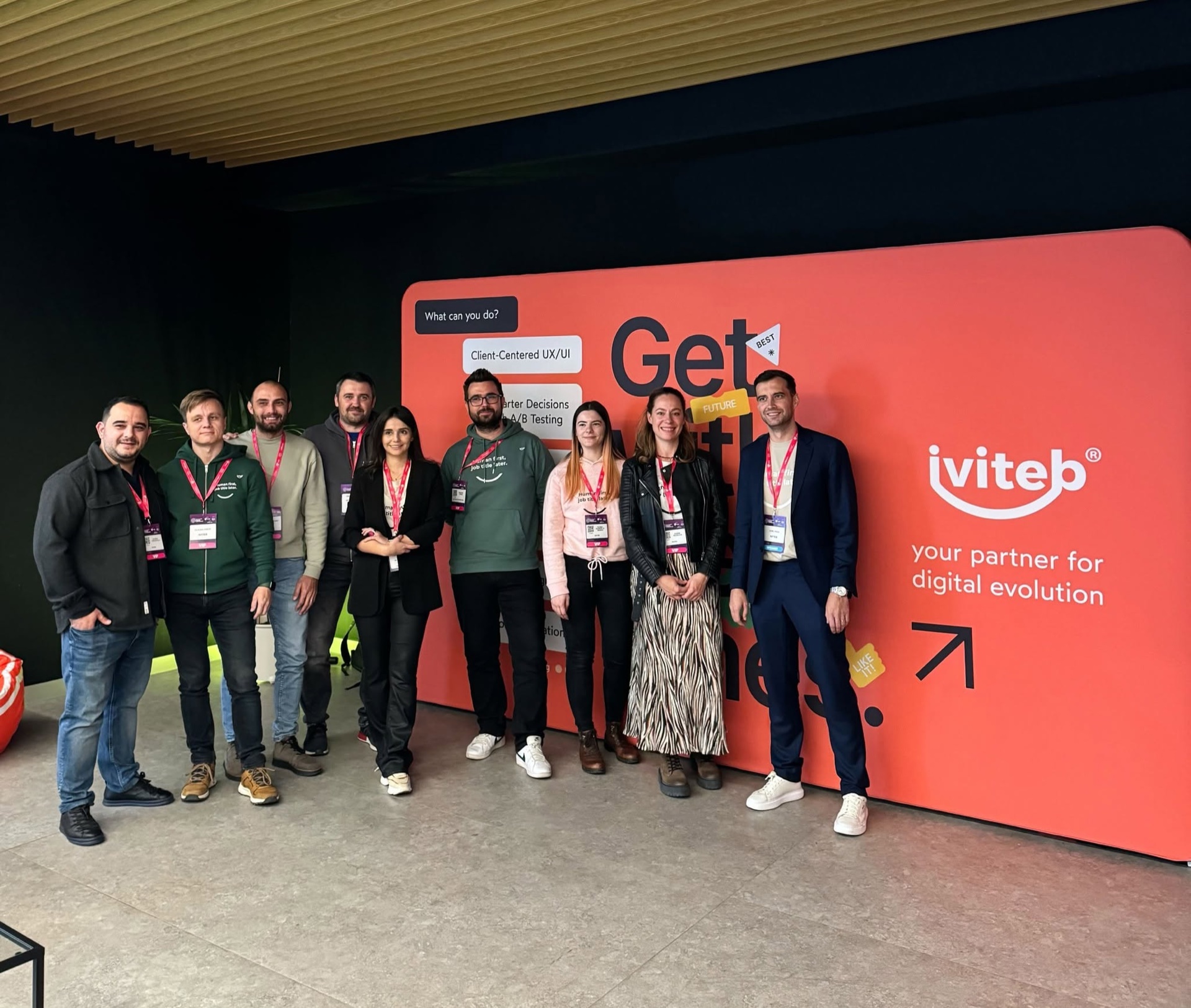 The ivi.works team together at a digital experience event